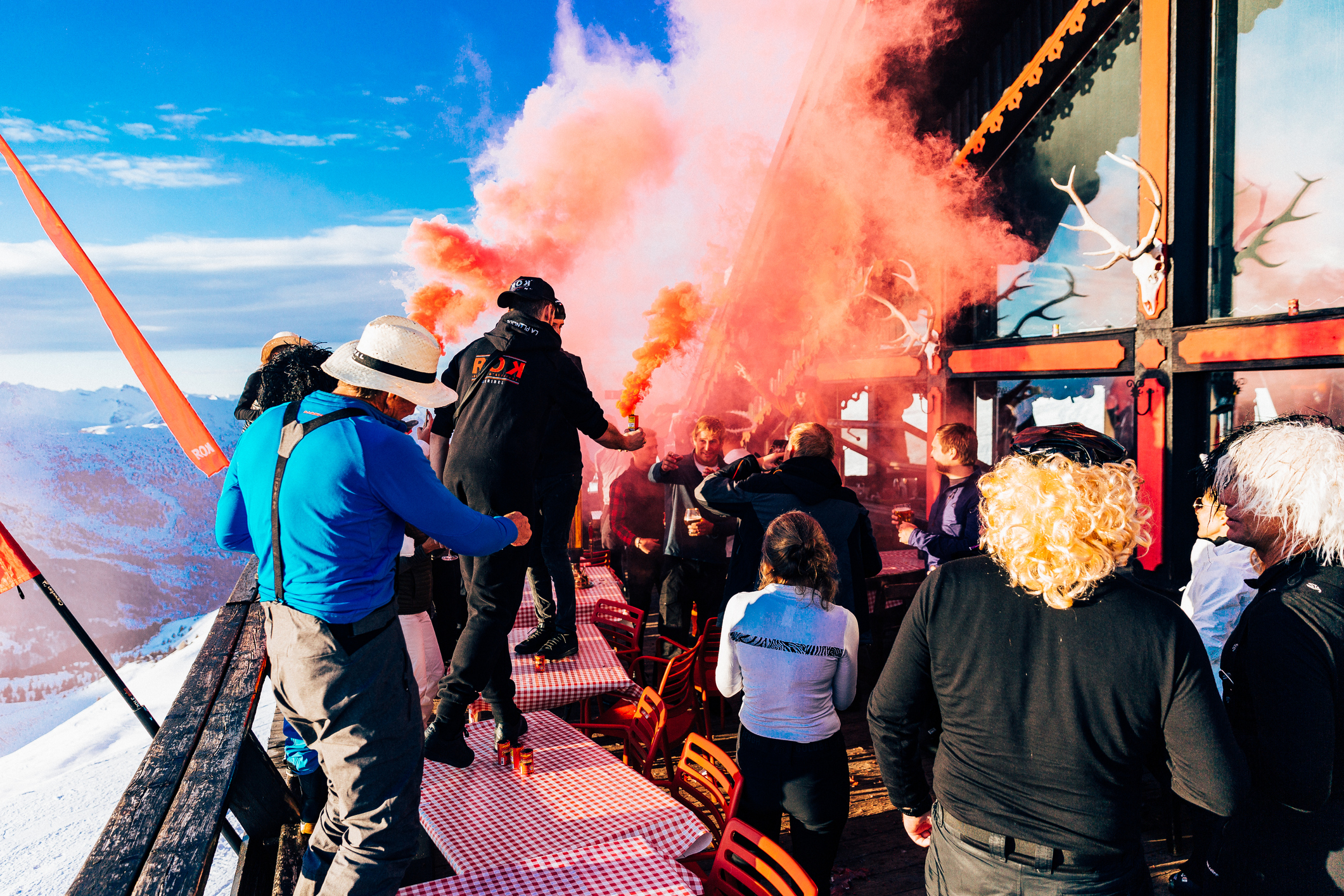 Skiers in Maribel enjoy après ski on the mountain